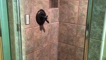 Bathtub, hair dryer, towels, soap