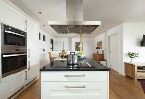Fridge, oven, dishwasher, high chair