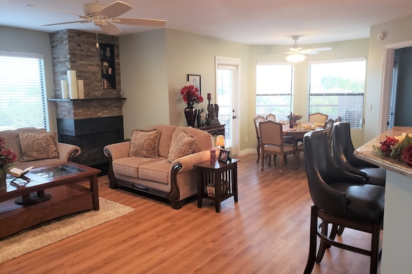 Living room and dining area during the day