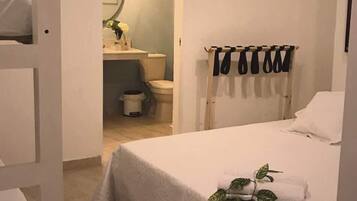 Habitación de diseñador | Sábanas de algodón egipcio, ropa de cama de alta calidad y wifi gratis