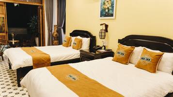 Family Room | Premium bedding, minibar, desk, blackout drapes