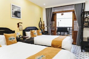 Family Room | Premium bedding, minibar, desk, blackout drapes - Hue 1962 Inn (Hue)