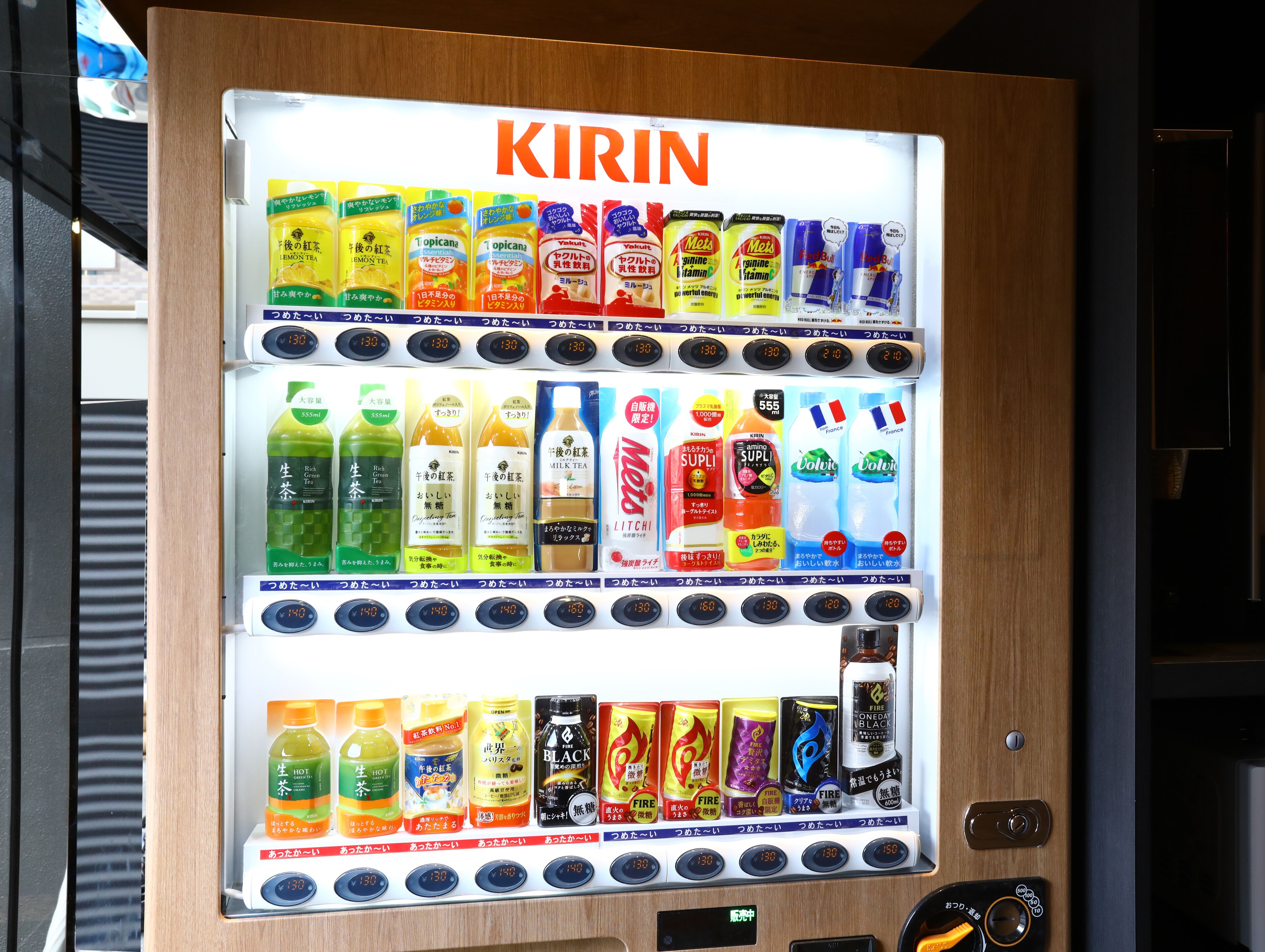 A vending machine with various beverages and snacks.