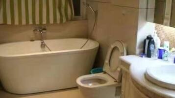 Bed in 10-Bed Female Dormitory | Bathroom | Shower, hair dryer, slippers, towels