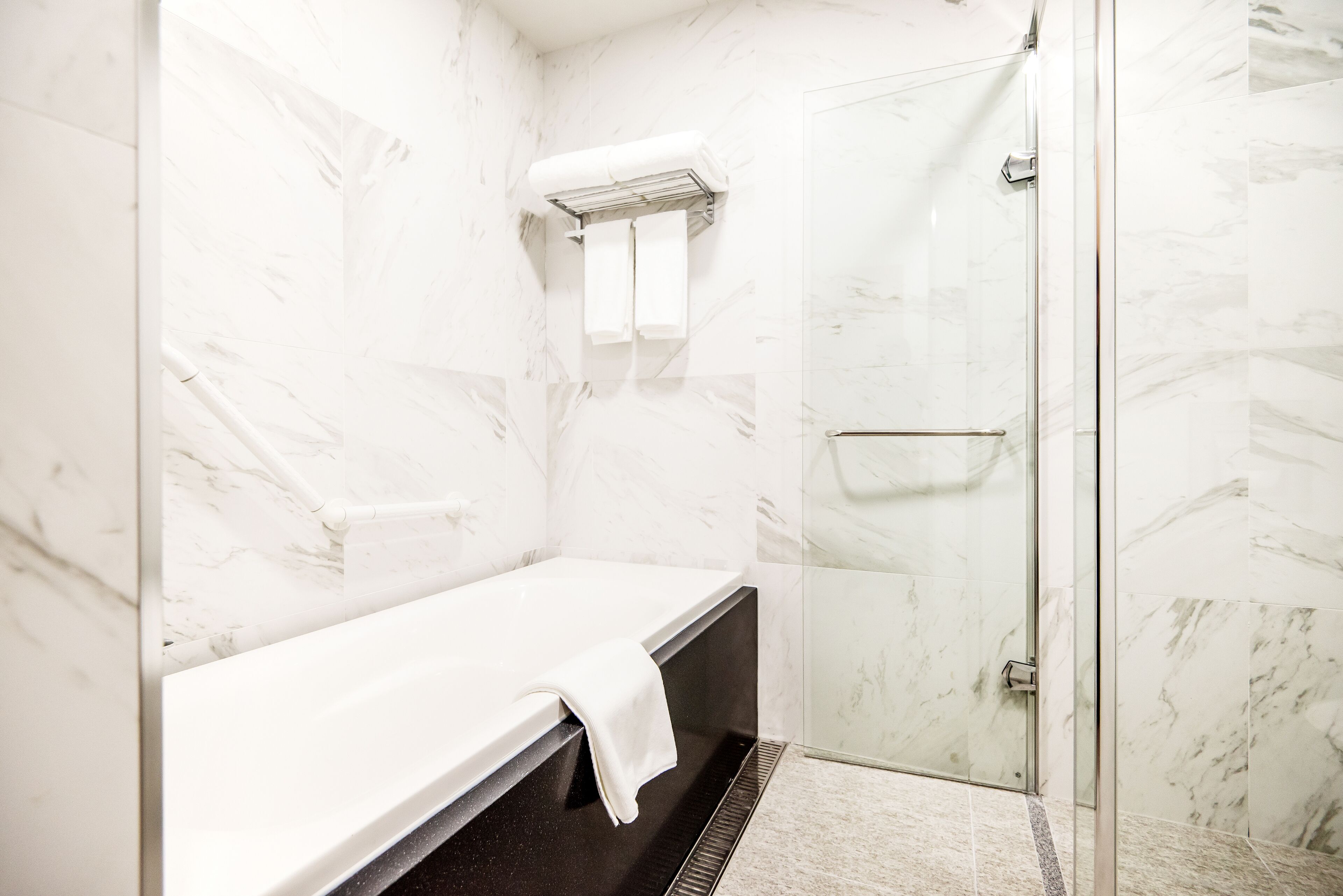 shower, hair dryer, bathrobes, slippers