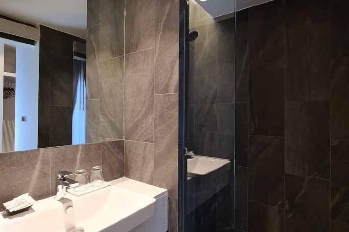 Bathroom | Shower, free toiletries, hair dryer, towels