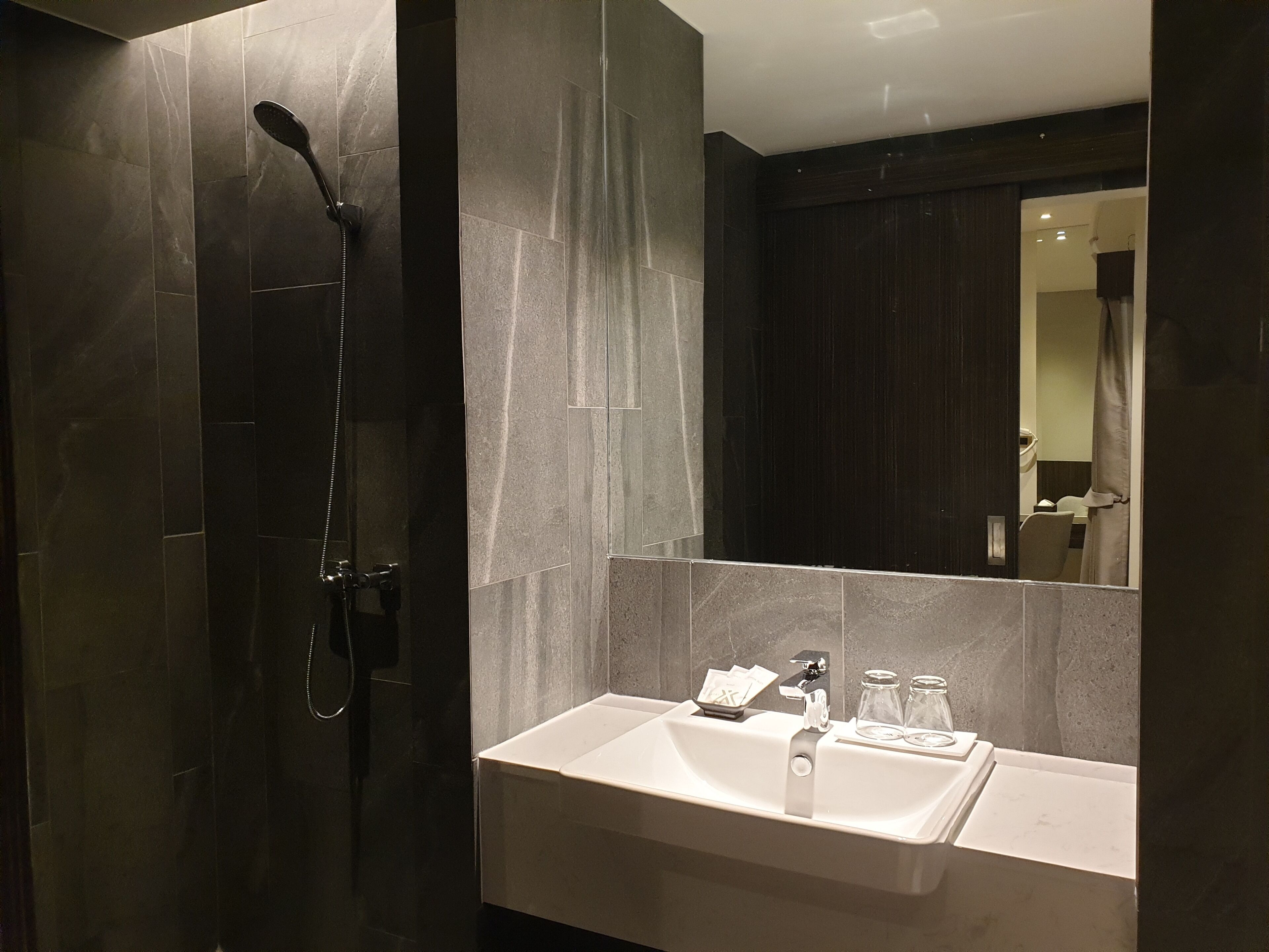 family room | bathroom | shower, free toiletries, hair dryer, towels