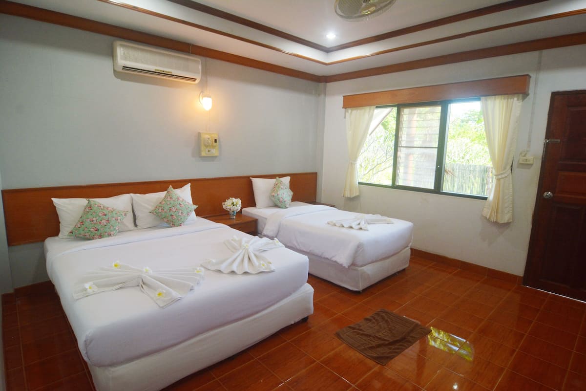Family Triple Room | 1 bedroom, blackout curtains, free WiFi, bed sheets