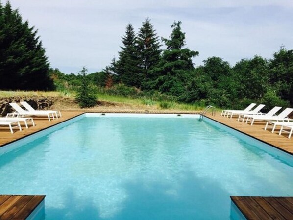 Outdoor pool, pool umbrellas, pool loungers