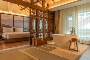 Suite, 1 kingsize bed, uitzicht op de stad | Luxe beddengoed, een bureau, verduisterende gordijnen