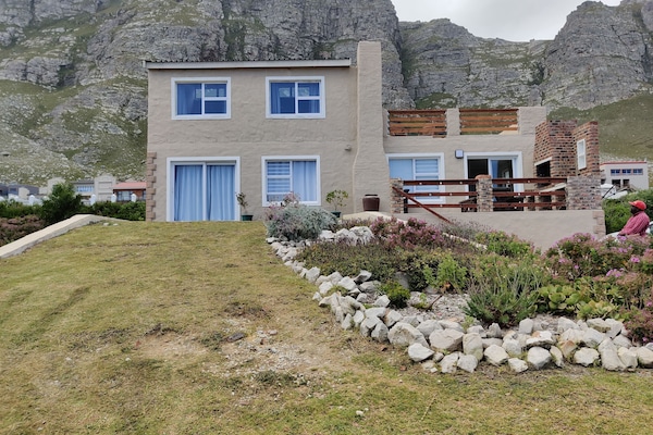 newly extended to include 4 bedrooms and 2 bathrooms