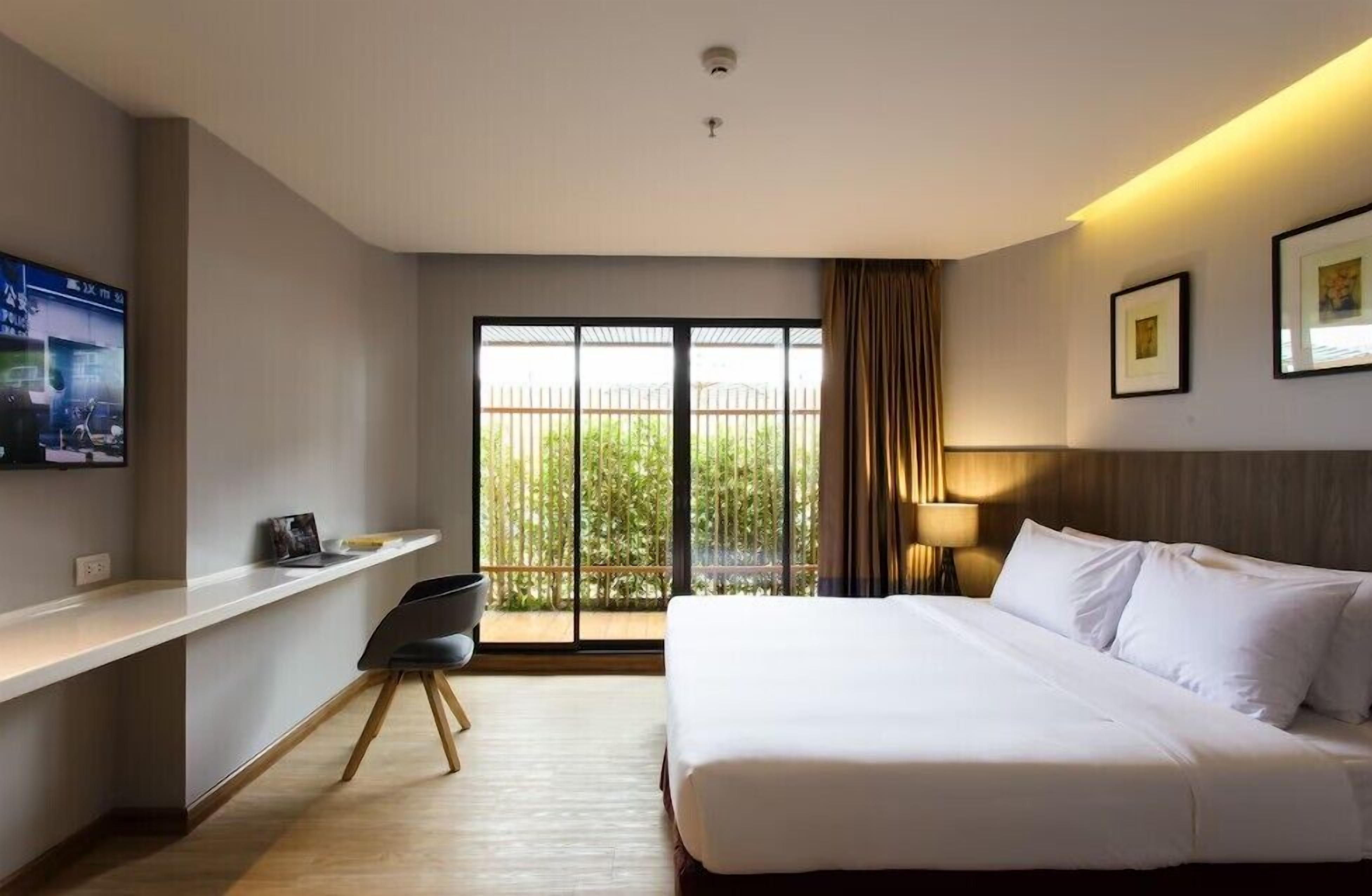 Suite Deluxe, 1 habitación | Caja de seguridad en la habitación, escritorio y insonorización 