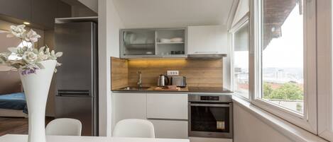 Duplex Apartment, Free Parking | Private kitchen | Fridge, oven, stovetop, electric kettle