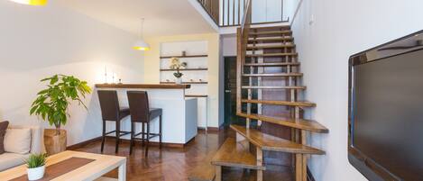 Duplex Apartment, Free Parking | Living room | Flat-screen TV