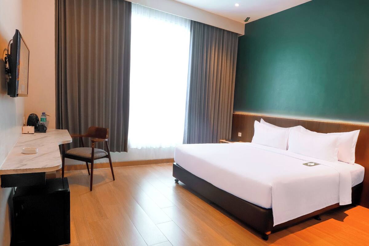 Habitación ejecutiva doble | Escritorio, wifi gratis, ropa de cama