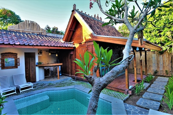 an antique crafted teak wood holiday home ..