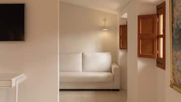 Suite Deluxe | 1 dormitori, roba de llit d'alta qualitat i cobrellits
