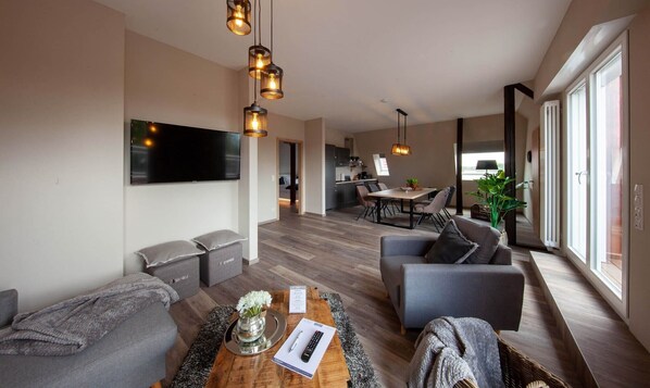 Apartemen Panorama | Ruang keluarga | Smart TV