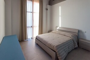 Quadruple Room | Kalis bunyi, katil bayi/kot (surcaj), Wi-fi percuma, cadar katil 