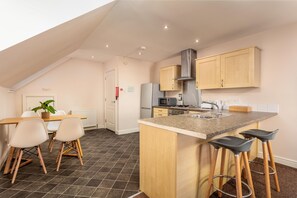 Basic Apartment, 2 Bedrooms, Non Smoking | Private kitchen | Full-size fridge, microwave, oven, stovetop