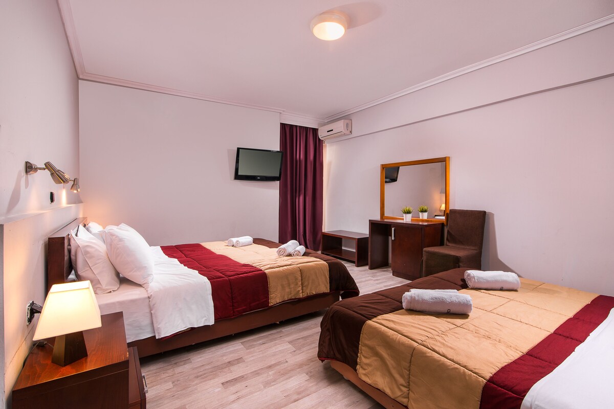 Quadruple Room, City View | Iron/ironing board, free cots/infant beds, free WiFi, bed sheets