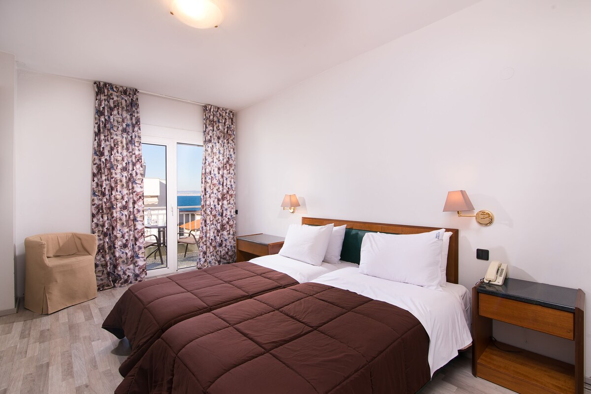 Economy Double or Twin Room | Iron/ironing board, free cots/infant beds, free WiFi, bed sheets