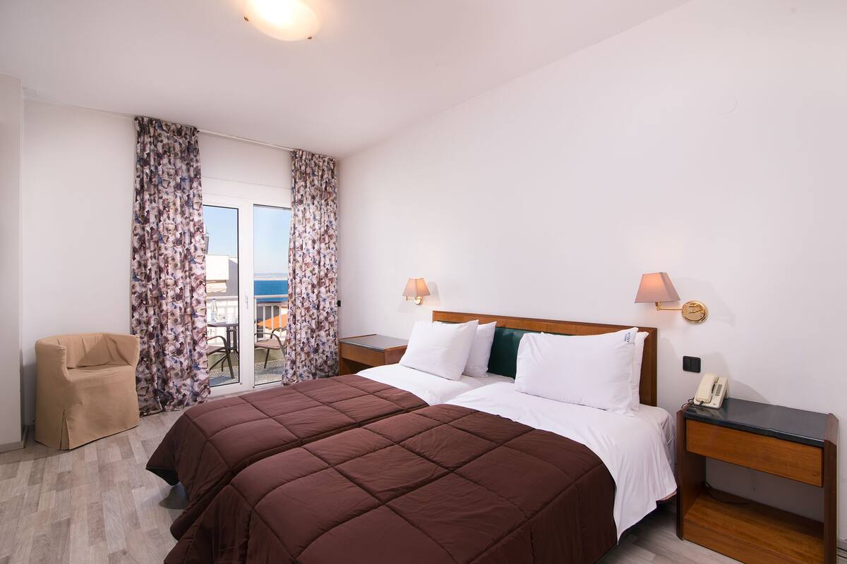Economy Double or Twin Room | Iron/ironing board, free cots/infant beds, free WiFi, bed sheets