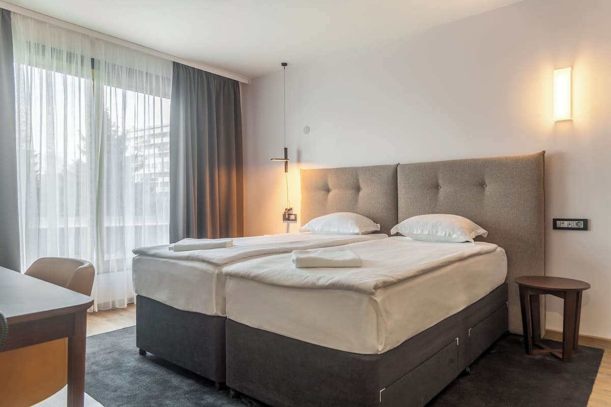 Hypo-allergenic bedding available, down comforters, memory foam beds