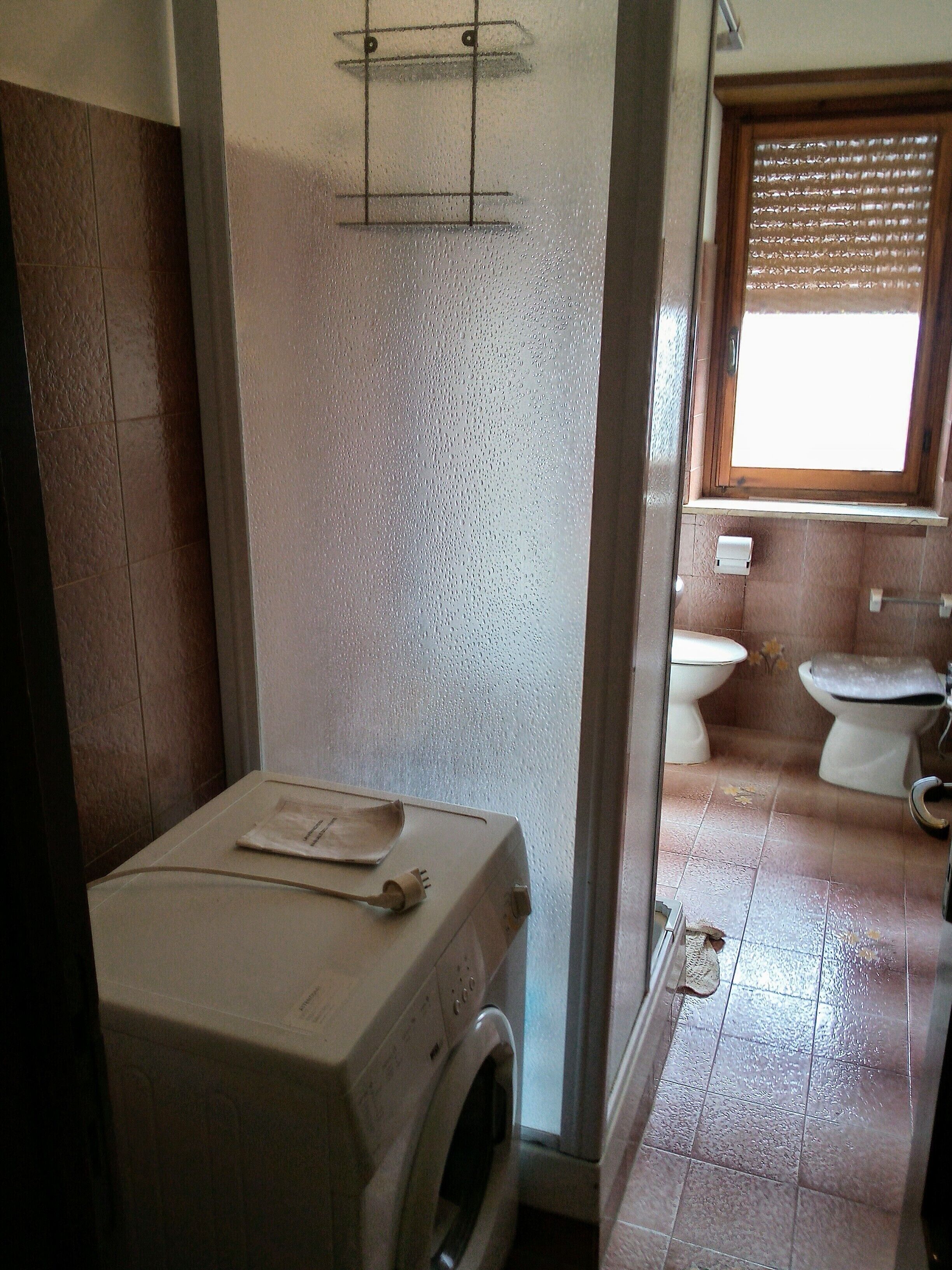 Badkar, hårtork, bidé och handdukar