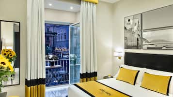 Habitación Deluxe, vista a la ciudad (FINESTRELLA DI MARECHIARO) | Sábanas de algodón egipcio, ropa de cama de alta calidad y minibar