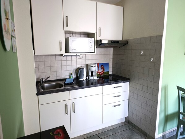 Fridge, microwave, coffee/tea maker, electric kettle