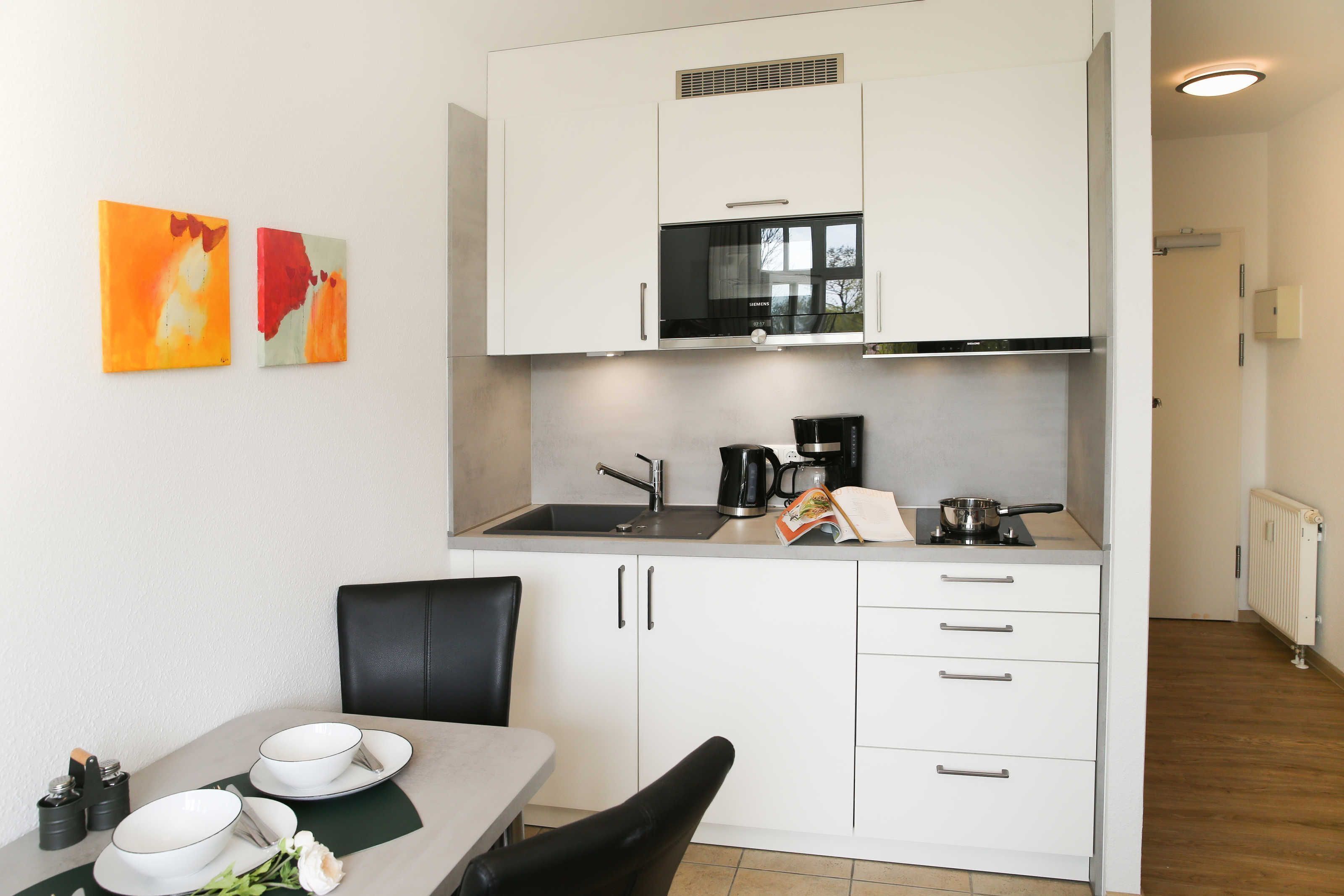 Fridge, microwave, coffee/tea maker, electric kettle