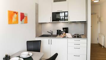 Fridge, microwave, coffee/tea maker, electric kettle