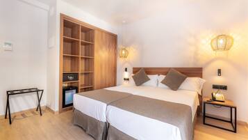 Minibar, coffres-forts dans les chambres, décoration personnalisée