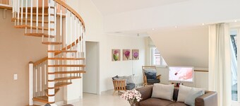 Captain’s Home. Exclusive loft apartment, offers 144 square meters, with a fireplace.