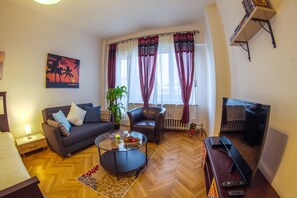 Télévision, lecteur de DVD, vidéothèque