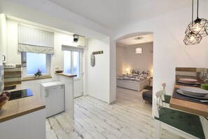 Apartment, 1 Bedroom | Private kitchen | Fridge, stovetop, dishwasher, coffee/tea maker - Petit Main Square Apartment (Zagreb)
