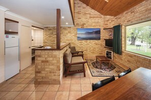 Loft Villa | Private kitchen | Full-sized fridge, microwave, stovetop, electric kettle
