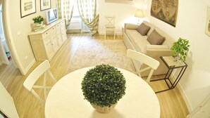 Apartment, 1 Bedroom | Living area | LCD TV - Flats4Rent Dimora del Viandante (Verona)