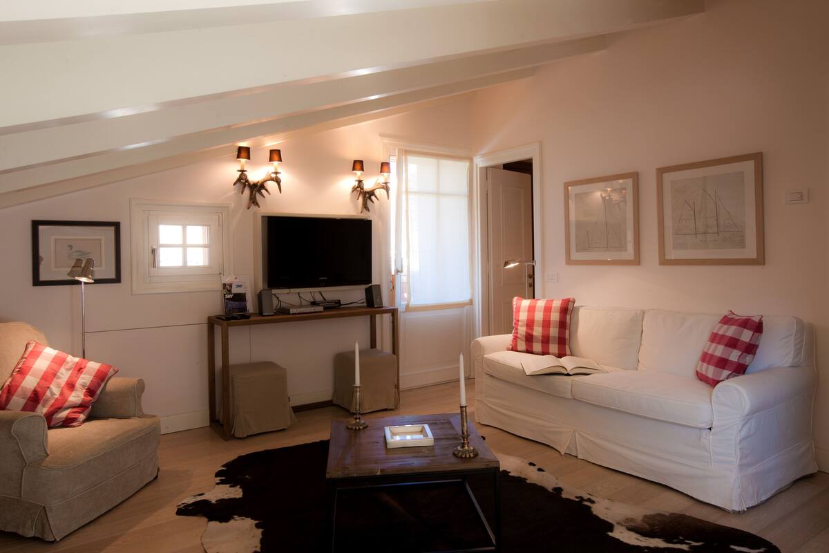 42-inch flat-screen TV with satellite channels, LED TV, pay films