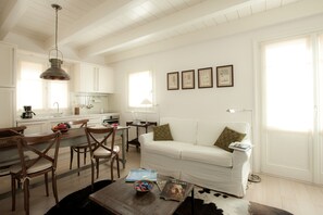 Een 42-inch flatscreentelevisie met satellietzenders en ledtelevisie