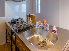 Fridge, microwave, stovetop, cookware/dishes/utensils