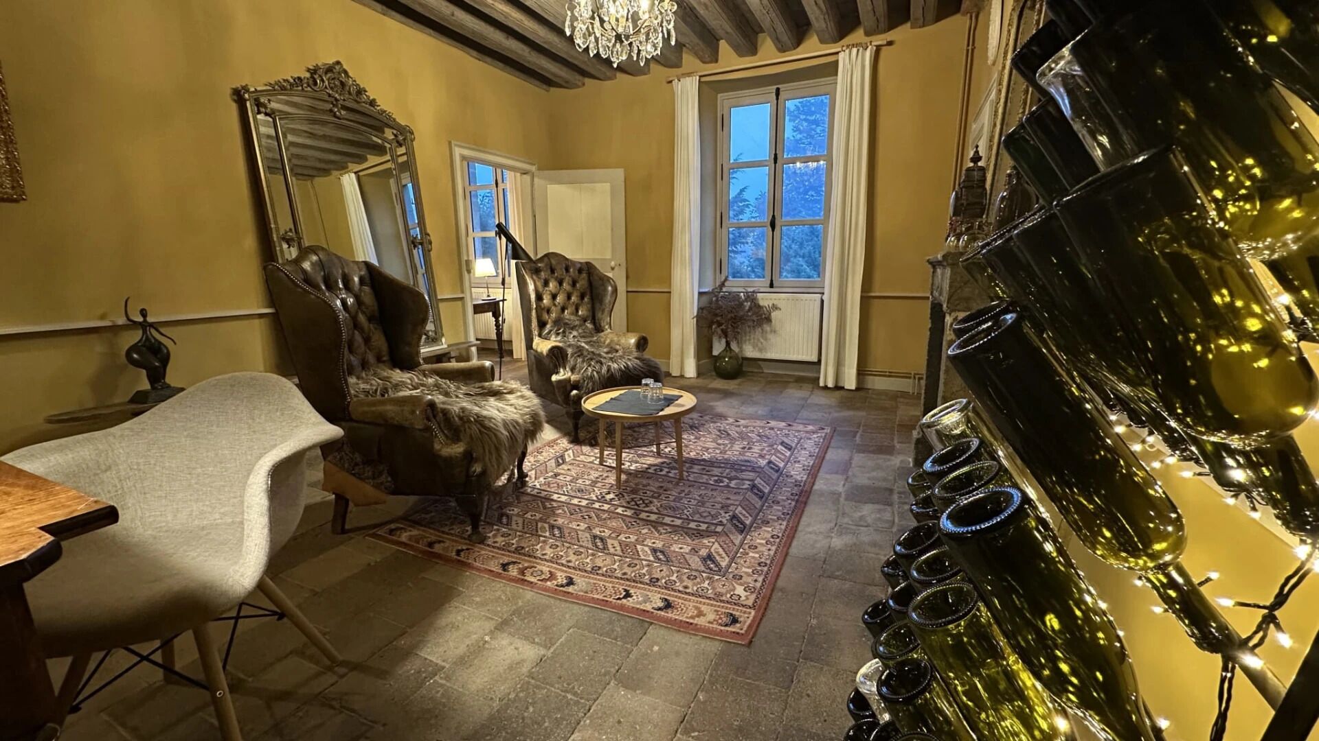 Deluxe Room, Garden View | Living area | Fireplace