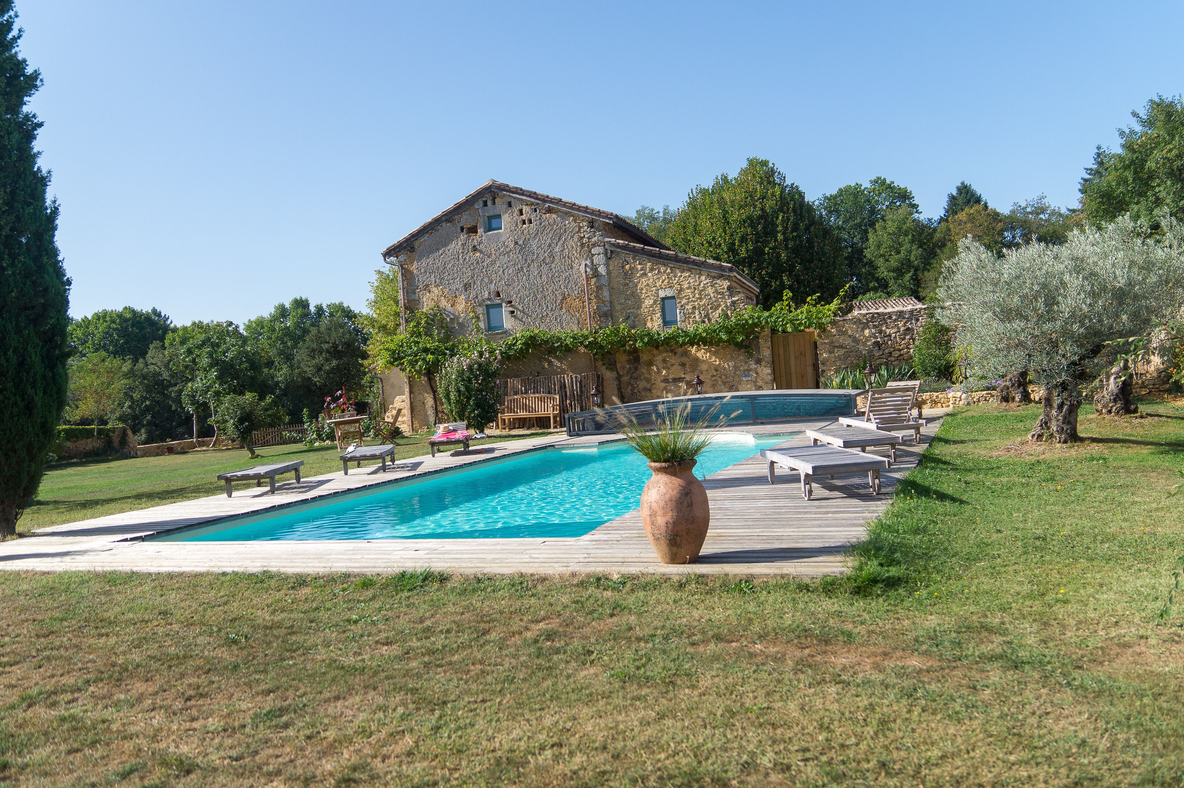 Seasonal outdoor pool, pool umbrellas, pool loungers