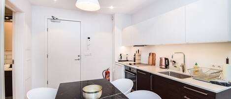 Deluxe studio | Woonruimte | Een flatscreentelevisie