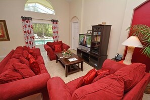 TV, DVD player - Luxurious 4 Bed 3.5 Bath Pool Home in Gated Community (Davenport)