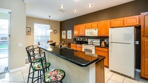 Coffee/tea maker, fridge, microwave, oven - Immaculate 5 Bedroom 5 Bath Pool Home in Windsor Hills Resort (Kissimmee)