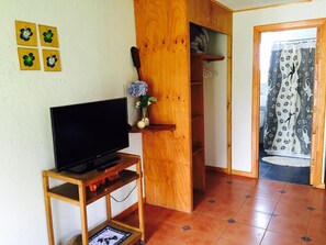 Classic Quadruple Room, Private Bathroom | Television - Harepakoba Guest House (Hanga Roa)