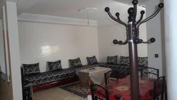 Standard Apartment, 2 Bedrooms | Living area | TV