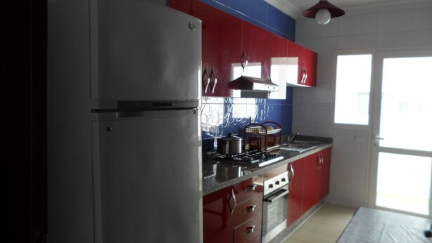 Standard Apartment, 2 Bedrooms | Private kitchen | Full-size fridge, microwave, oven, stovetop - Appartement El Jadida (El Jadida)